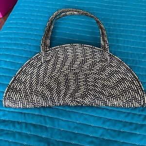 Brown/beige placemat shoulder bag.